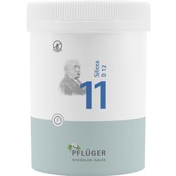 Eine weiße Dose mit der Aufschrift "11 Silicea D 12" und einem alten Mann abgebildet.